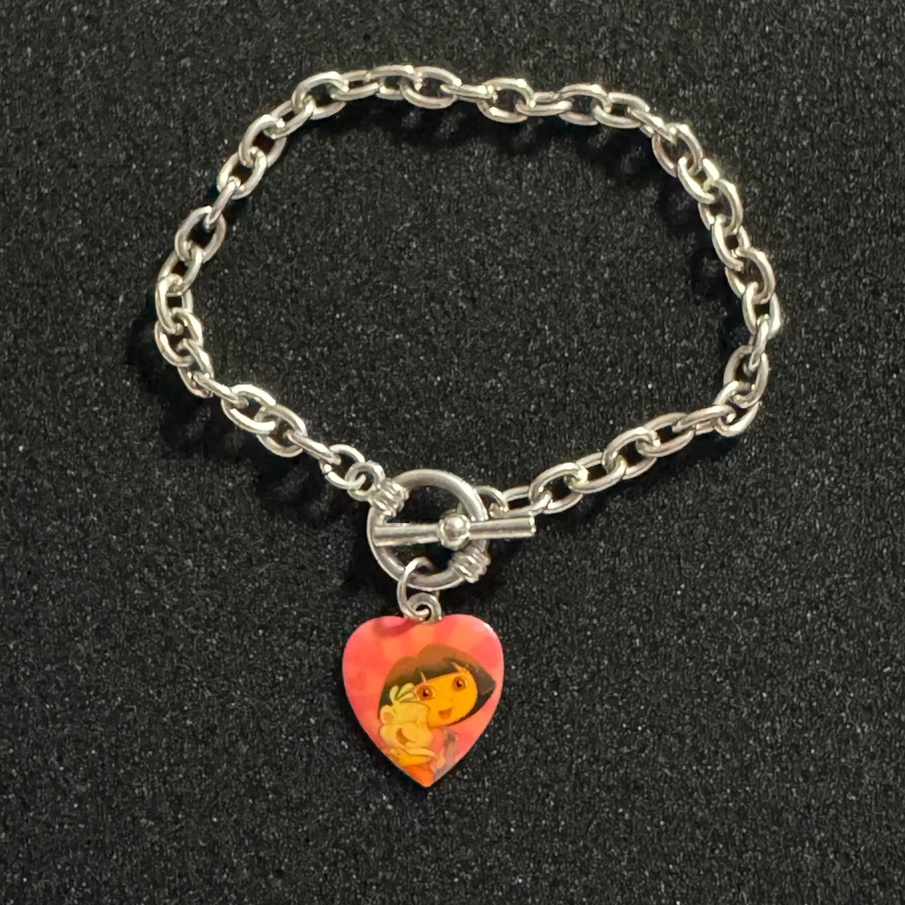 Dora the Explorer charm Bracelet 3 inches diameter 8 inches long